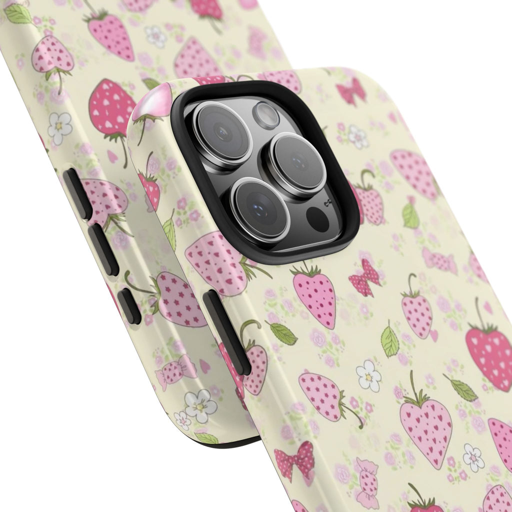 Strawberry Field phone case angled view, showing berry and flower print and camera cutouts