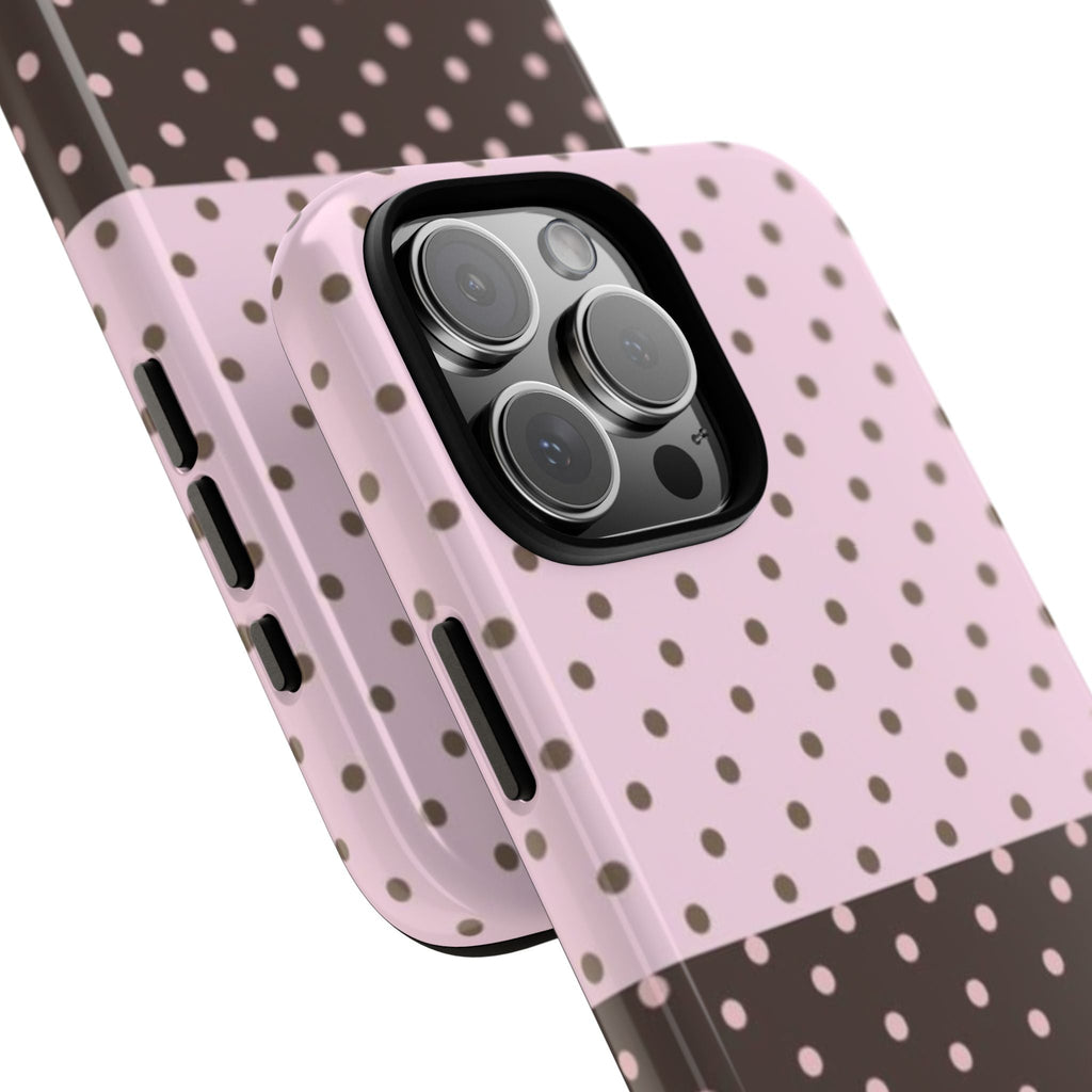 Polka-dot phone case with raised camera lenses and side button cutouts, pink & dark pattern
