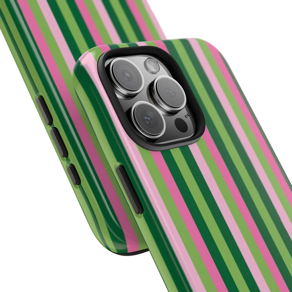 Strawberry matcha striped phone case close-up on camera, pink and green vertical stripes