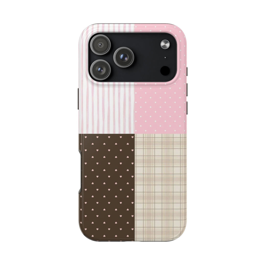 Pink phone case with vertical stripes, light polka dots, plaid, and dark heart pattern