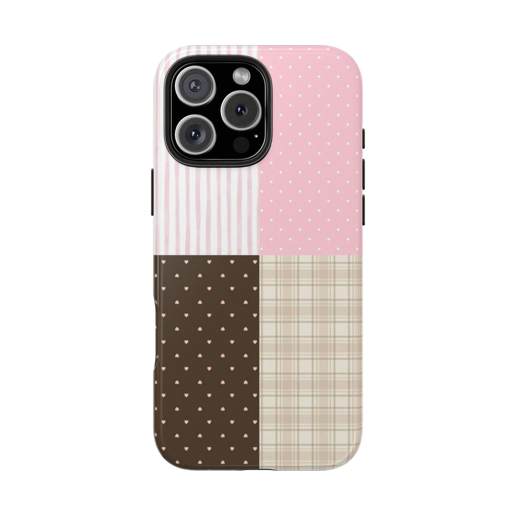 Pink and beige striped and polka dot phone case with plaid bottom and dark heart design
