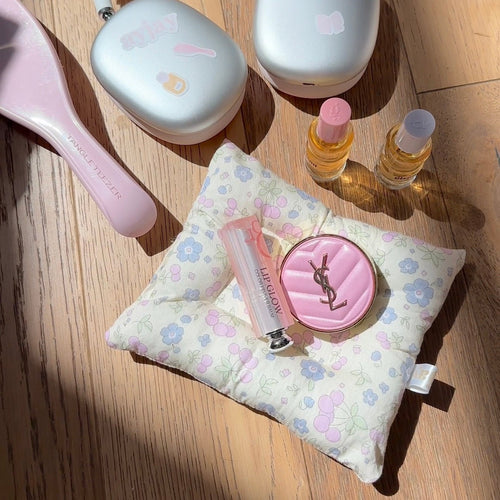 Summer floral cloud coaster in pastel blue and pink with pink circular logo detail