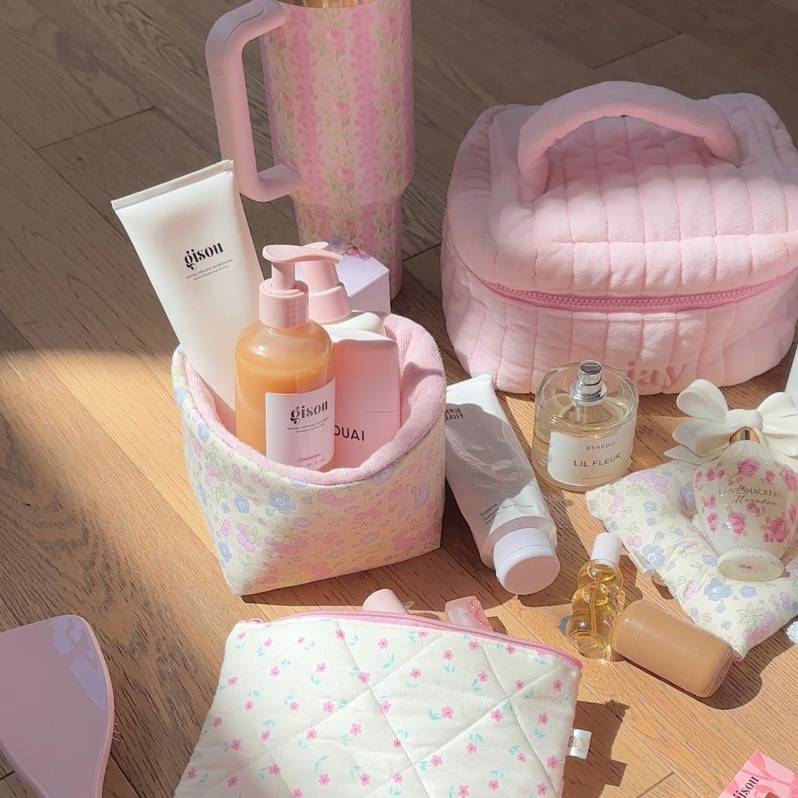 Pastel floral organizer with open bin and matching zip pouch, pink edging
