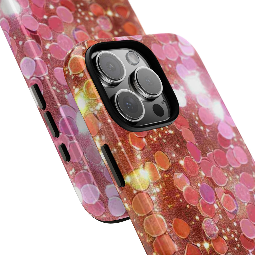 Phone case close-up with curved side protection and pink-orange bokeh sparkle design