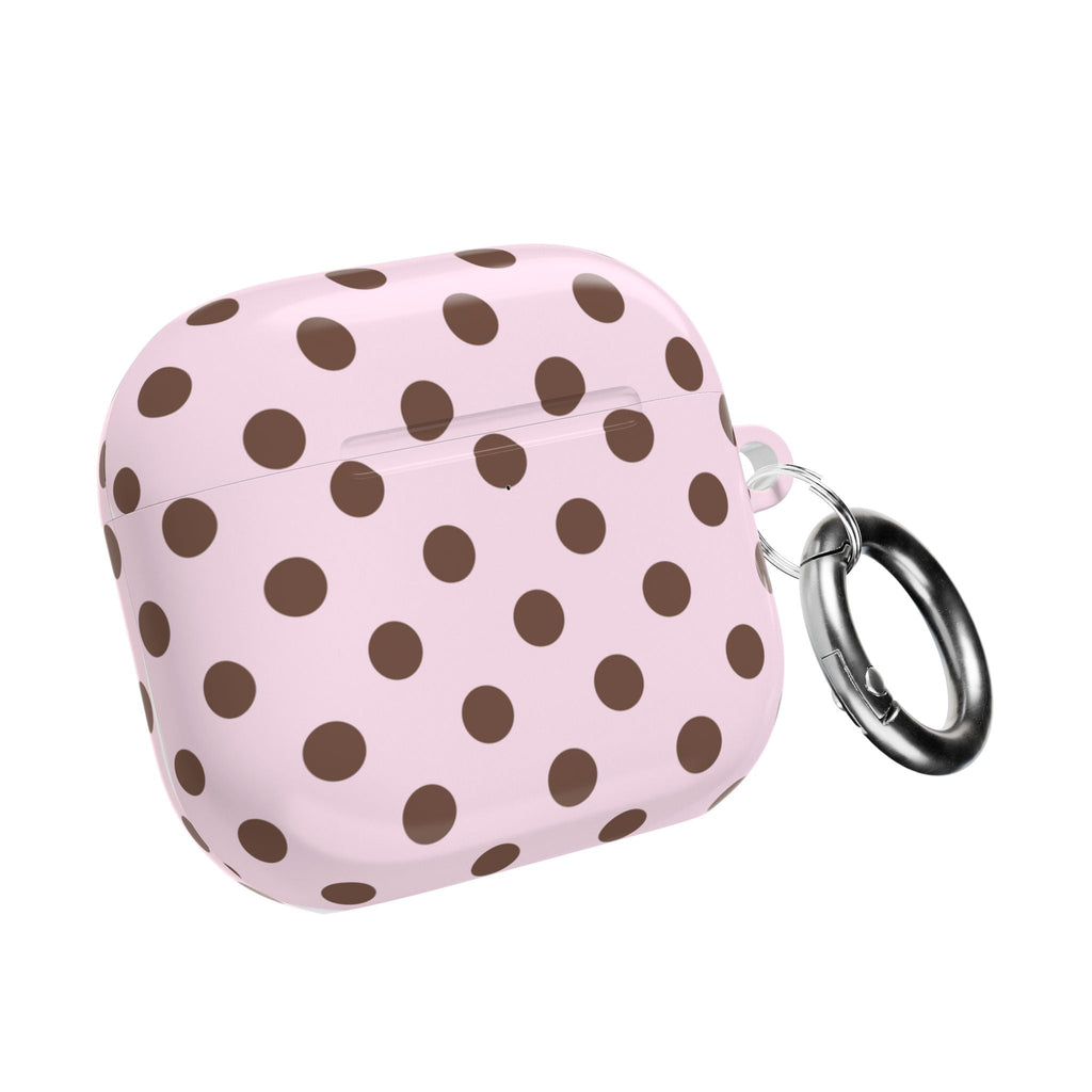 Pink polka dot AirPods case with metal keychain ring on the side