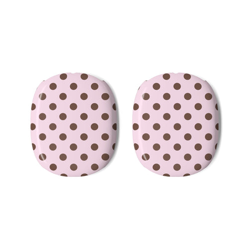 Two AirPods Max case covers, pink base with dark brown polka dot pattern