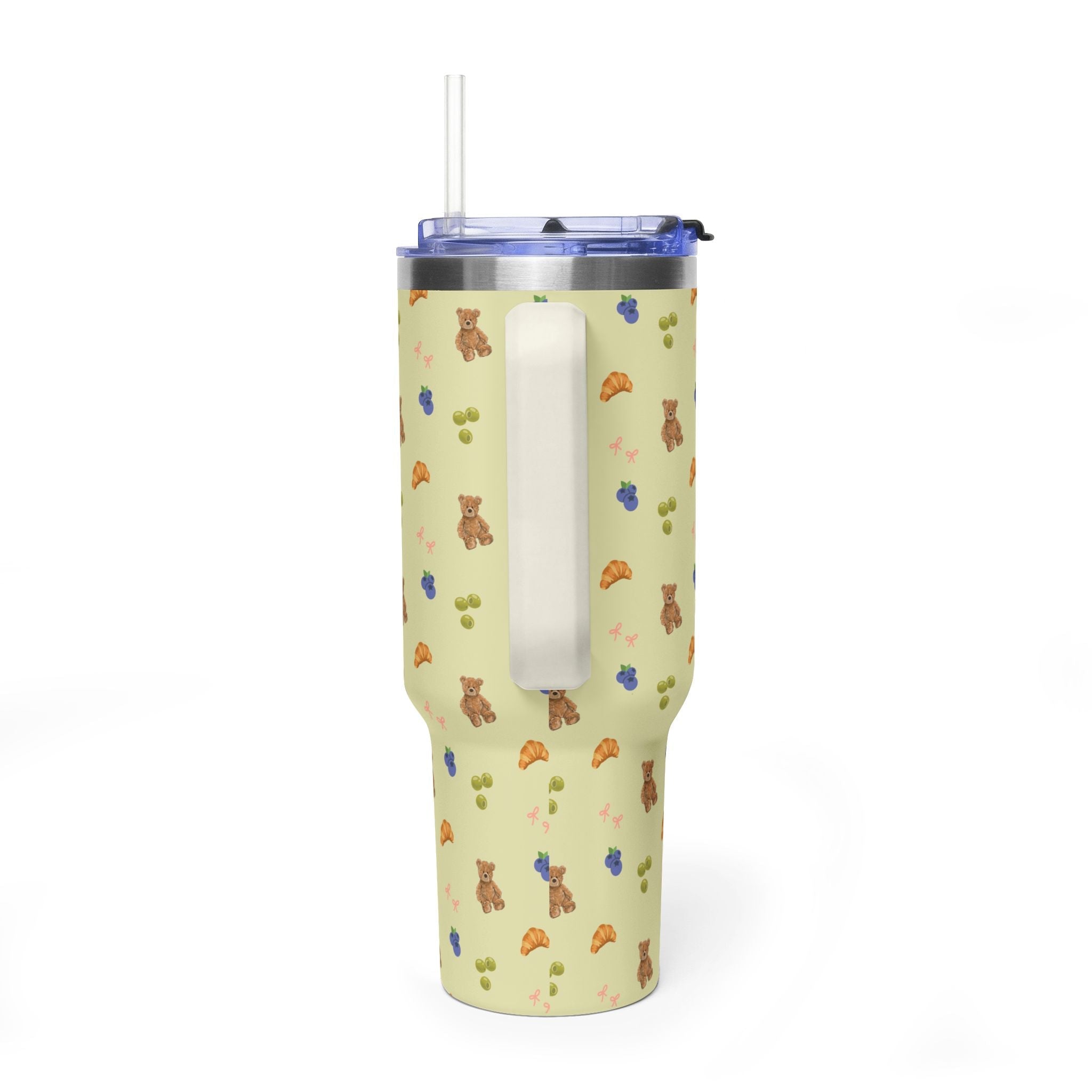 40 oz tumbler side view, metal insert visible, teddy/croissant pattern, blue lid