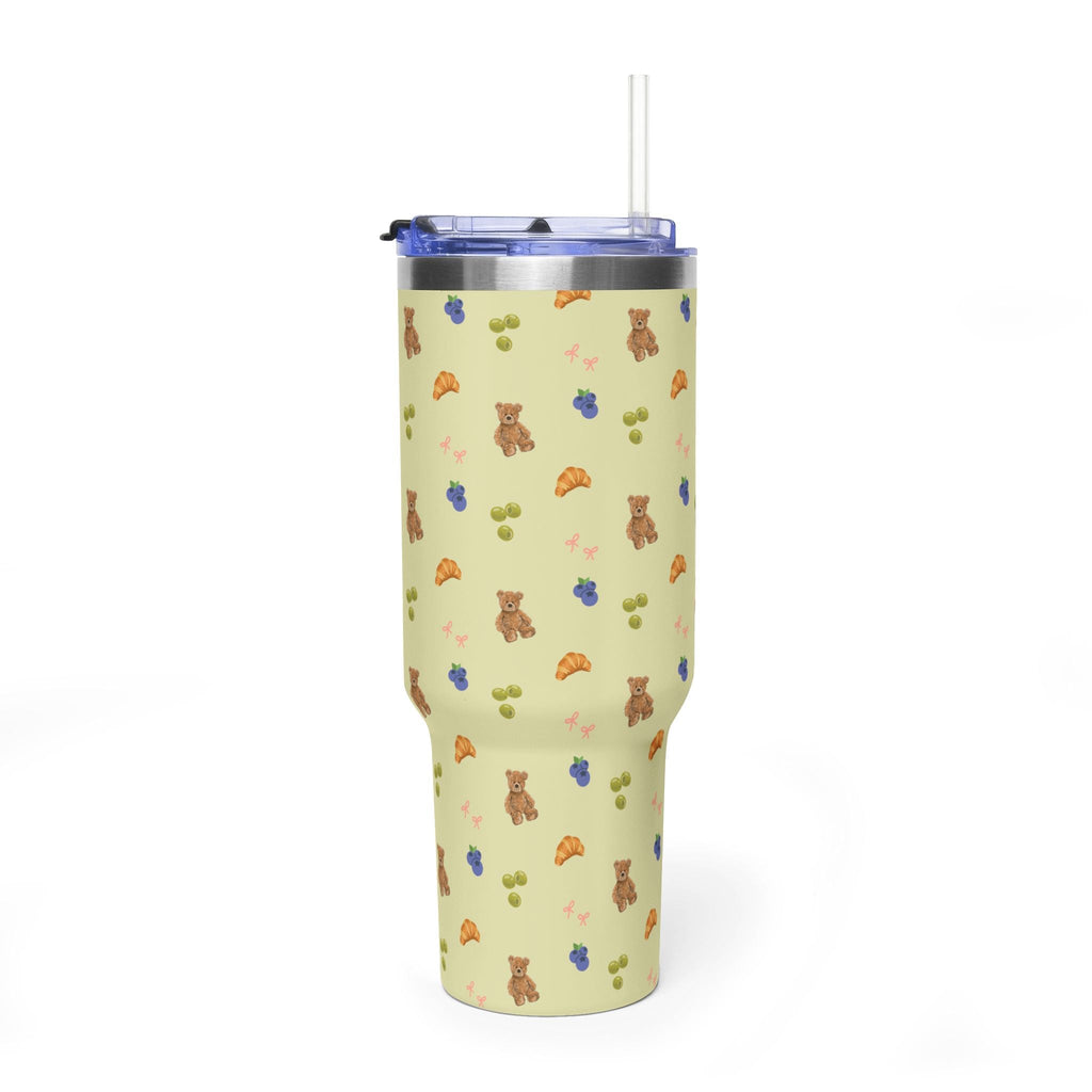 40 oz tumbler back view, teddy/croissant print, clear straw, blue lid