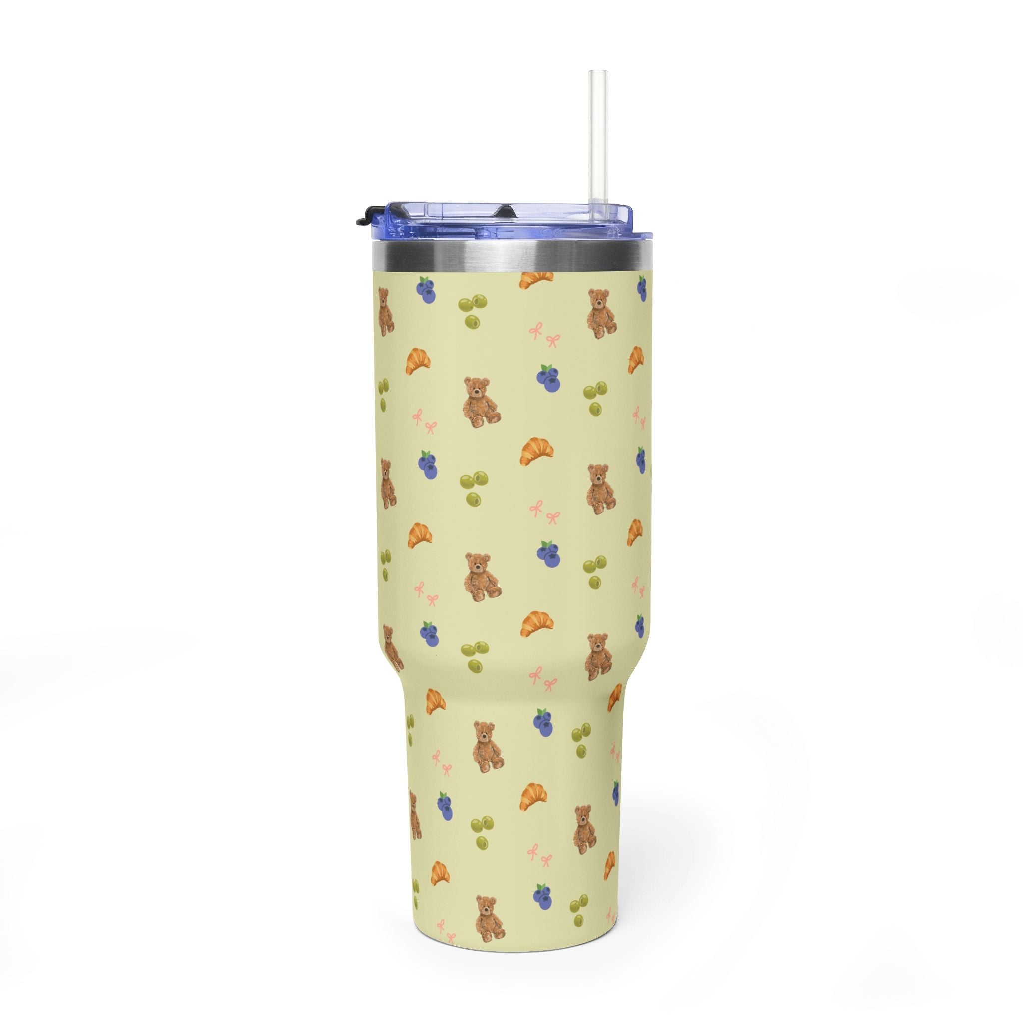 40 oz tumbler back view, teddy/croissant print, clear straw, blue lid