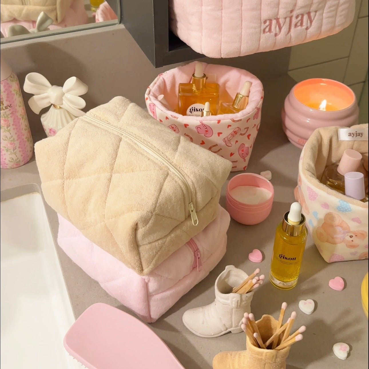 Beige teddy fleece zip makeup pouch with curved seam detail