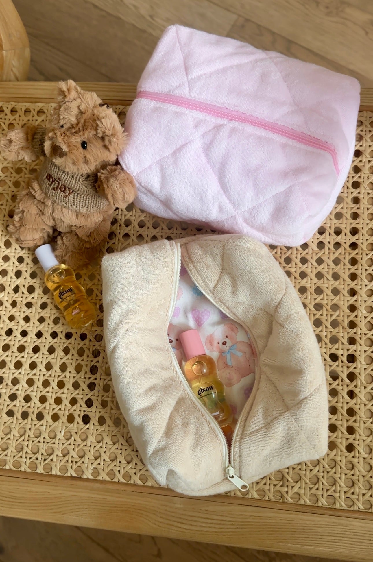 Beige teddy fleece zip pouch with pale pink zipper trim
