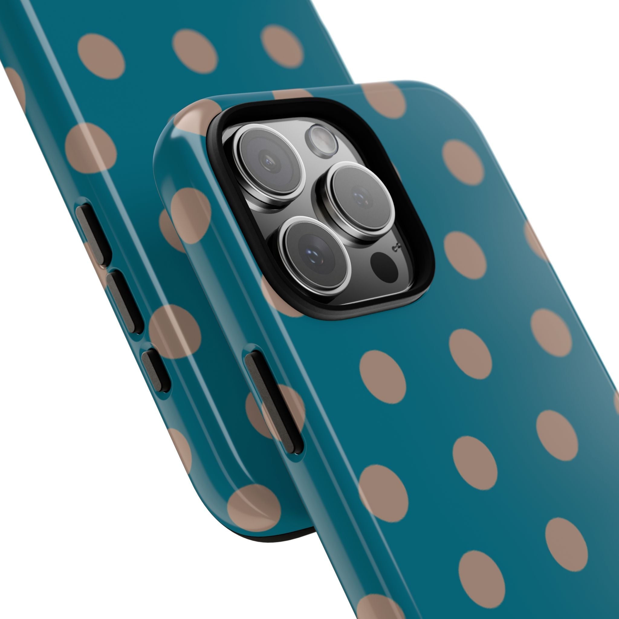 Angled teal polka dot phone case with tan dots; side buttons and camera visible