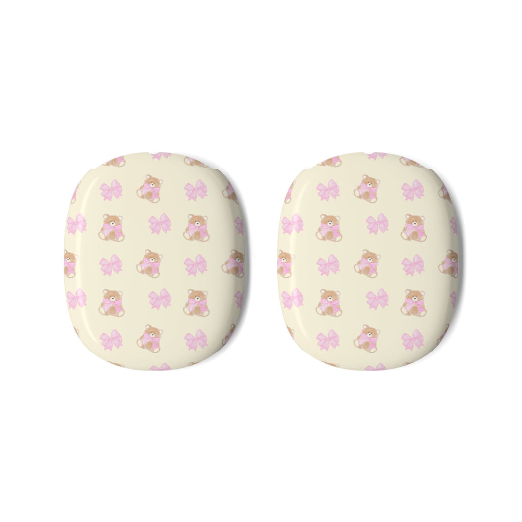 Pair of round ear pad covers in pale pink with teddy bear and butterfly print