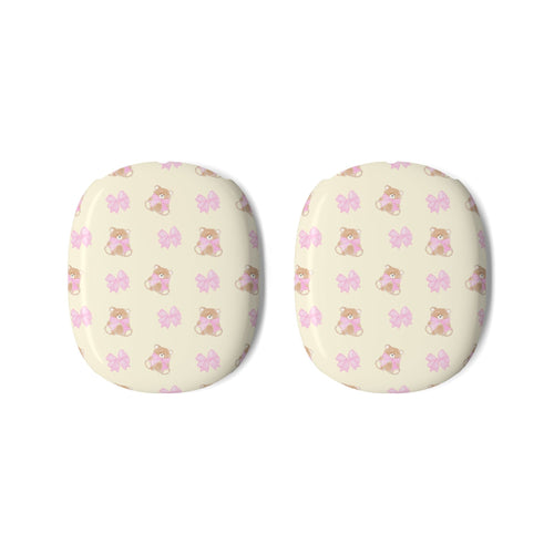 Pair of round ear pad covers in pale pink with teddy bear and butterfly print