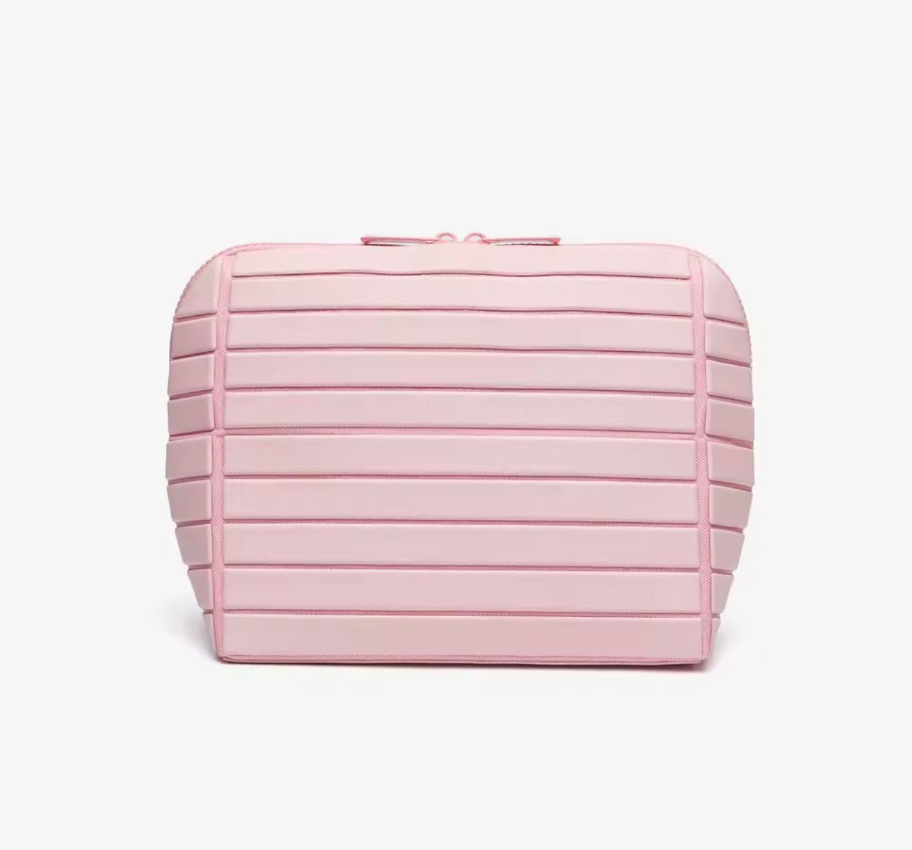 Pink compact flex case with ribbed side panels and top zipper pull