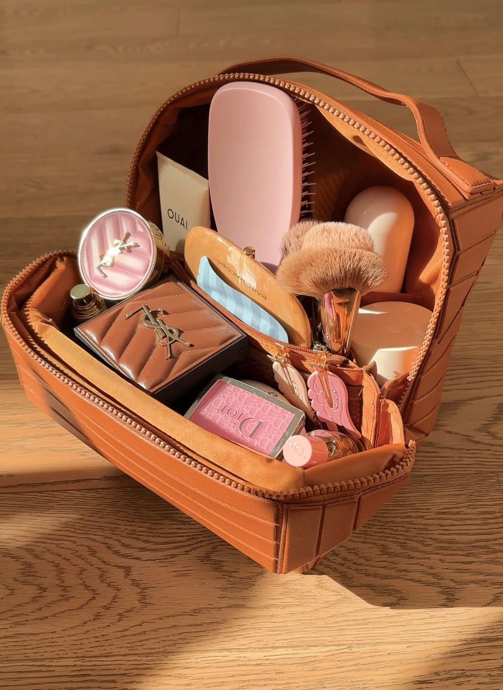Mocha-brown zippered Grab-All Flex case XL, open with makeup brushes and bottles inside