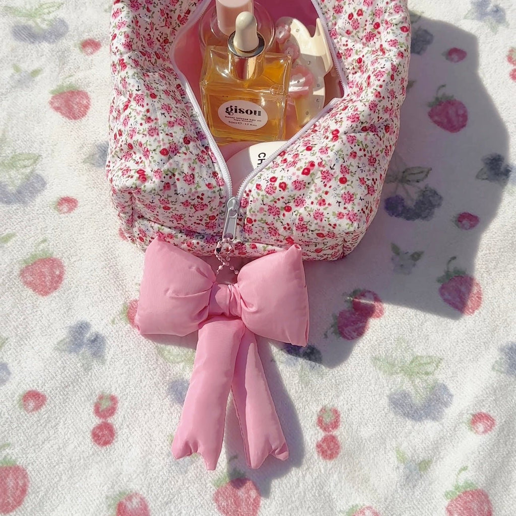 Pink large bow bag charm with oversized bow and dangling ribbon ends