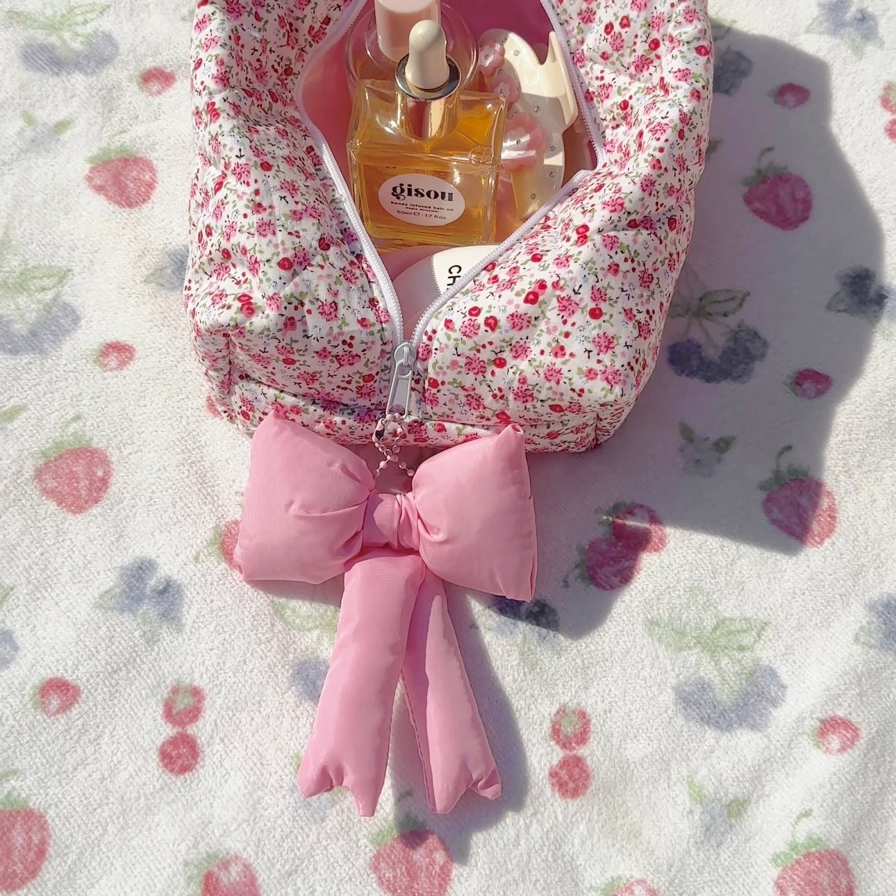 Pink large bow bag charm with oversized bow and dangling ribbon ends