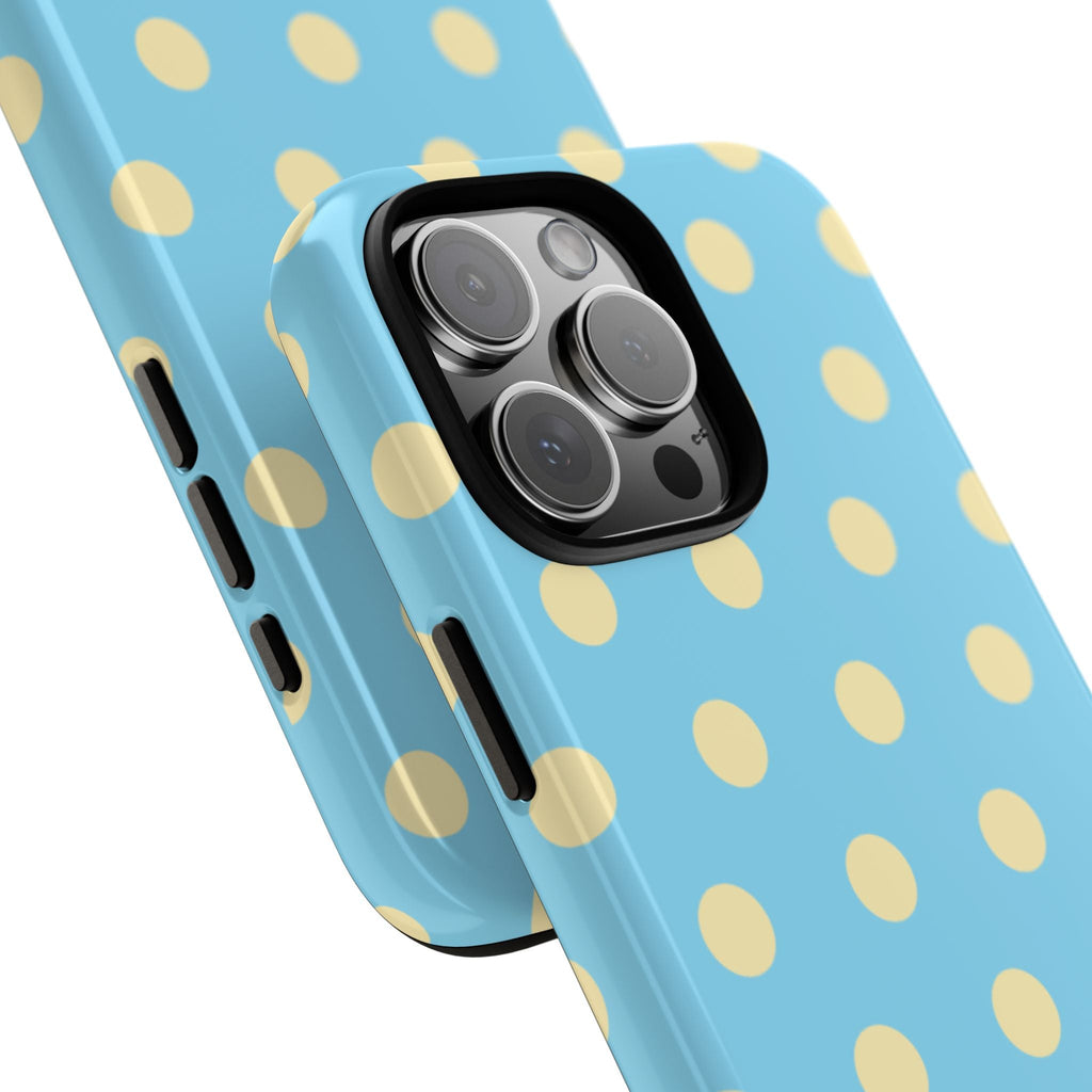 Close-up of light blue phone case with yellow polka dots and raised camera lenses