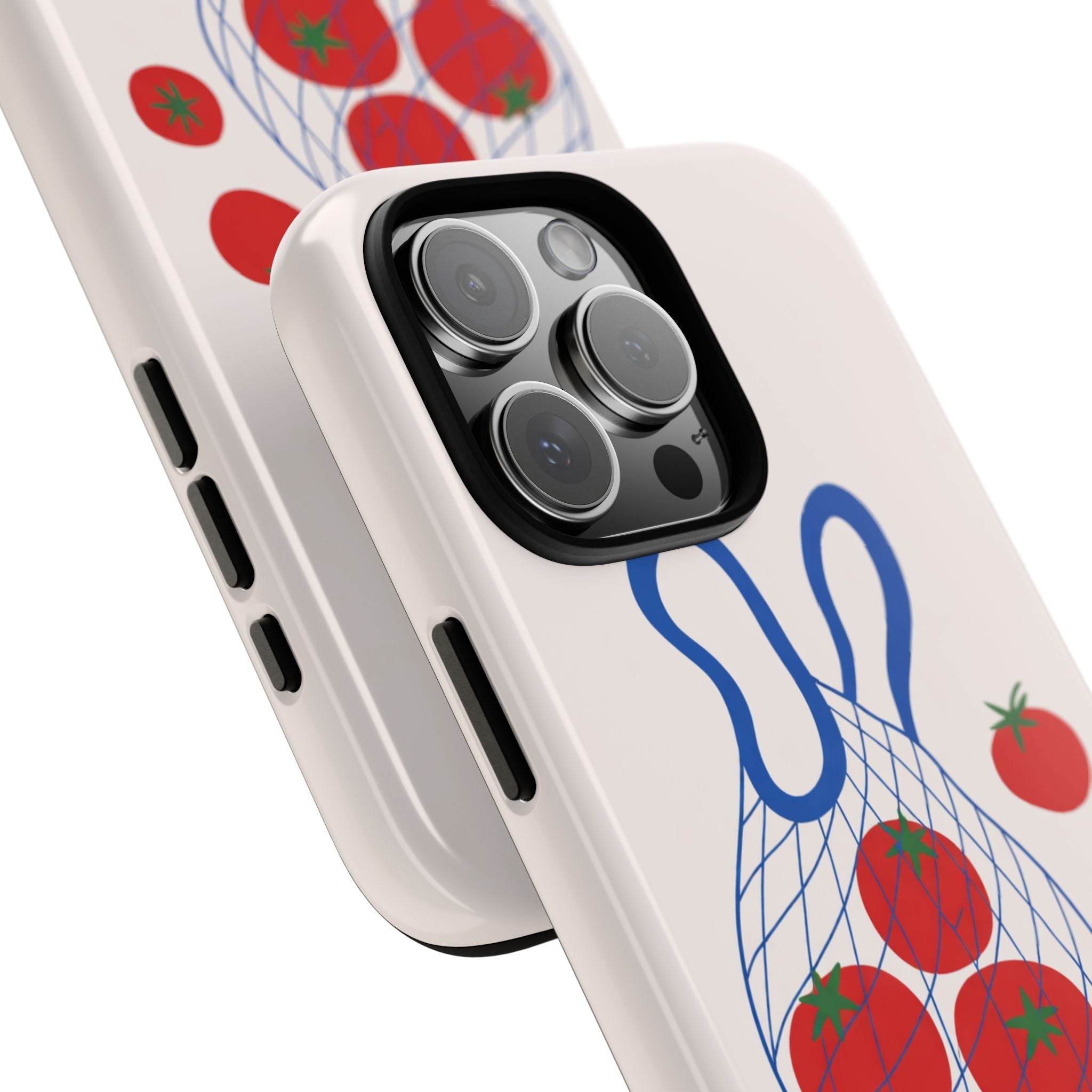 Angled cream phone case with blue tomato design, red tomatoes, and camera lens cutouts