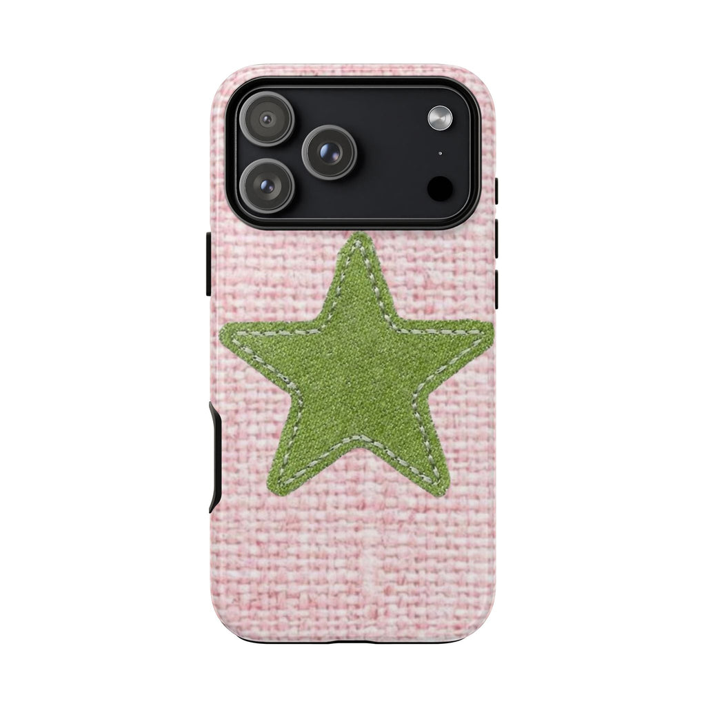 Pink tweed phone case with green star appliqué, dark camera panel and lens cutouts