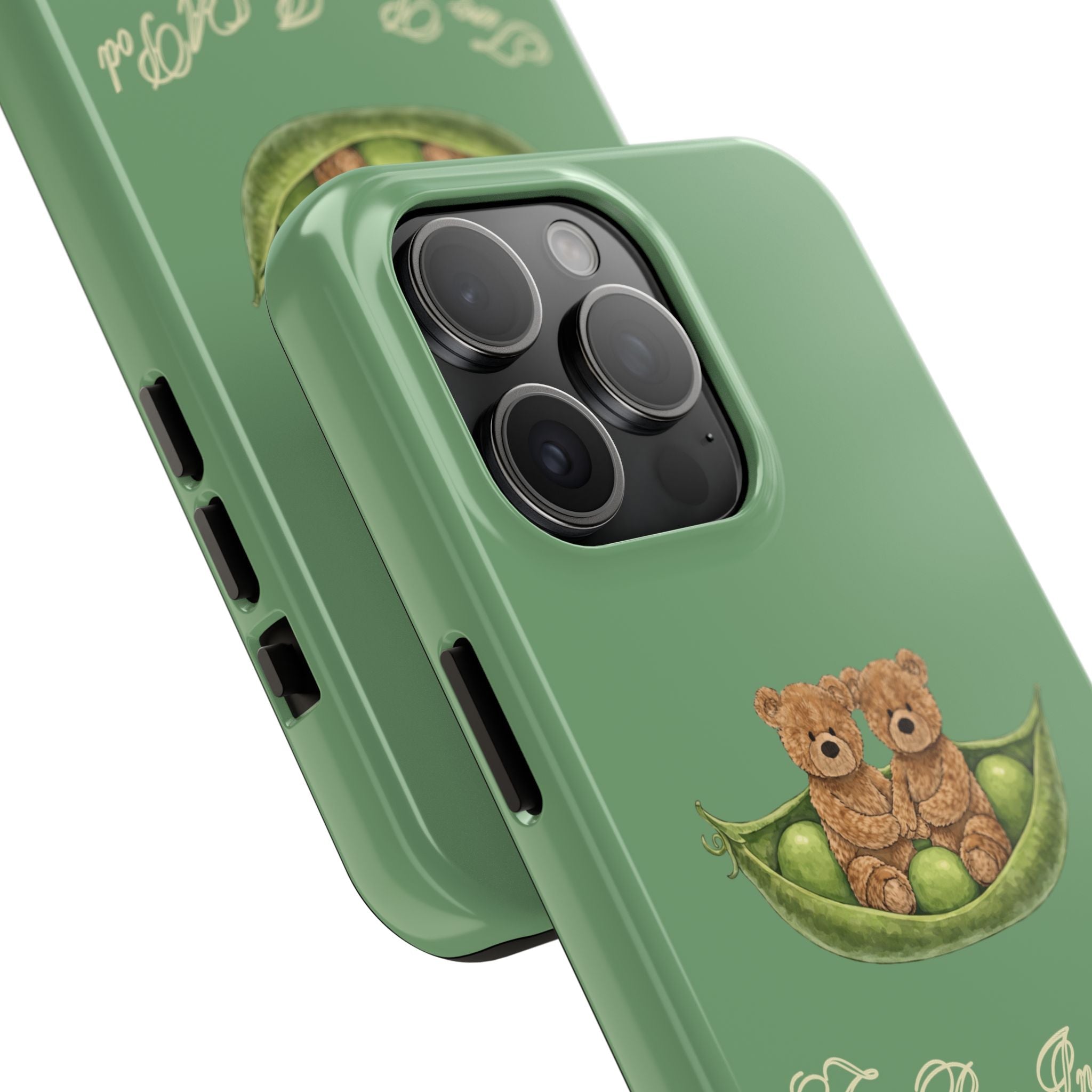 Green phone case close-up with two teddy bears in a pea pod graphic