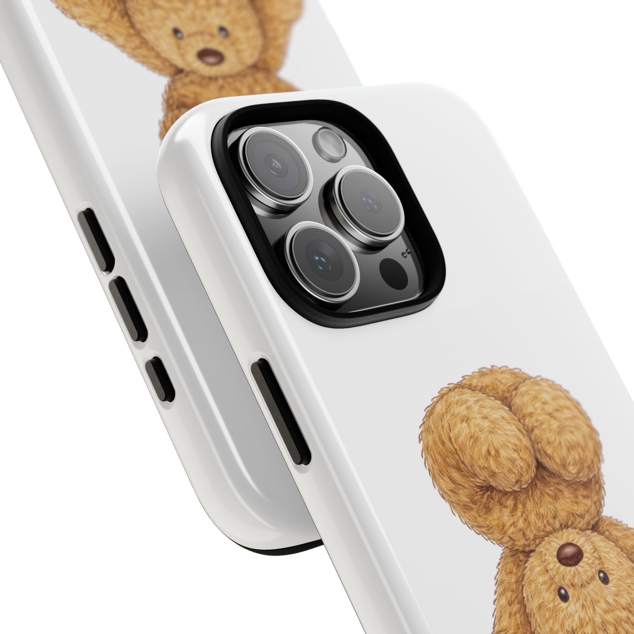 Close-up of white phone case camera area with upside-down teddy bear face design