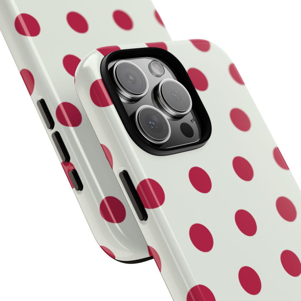 Side view of vanilla phone case with red polka dot print and camera cutout
