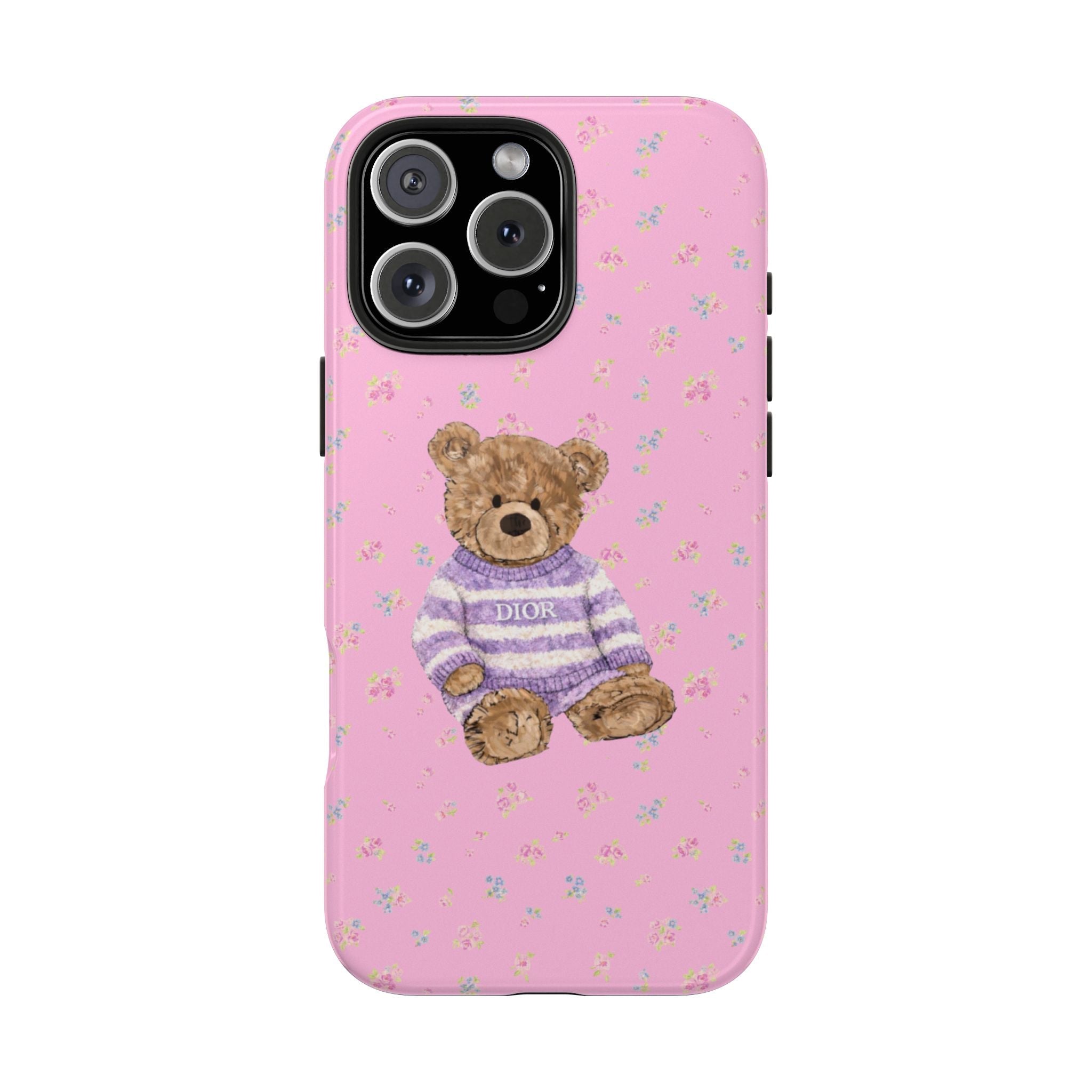 Pink phone case with tiny floral pattern and teddy bear in purple striped sweater