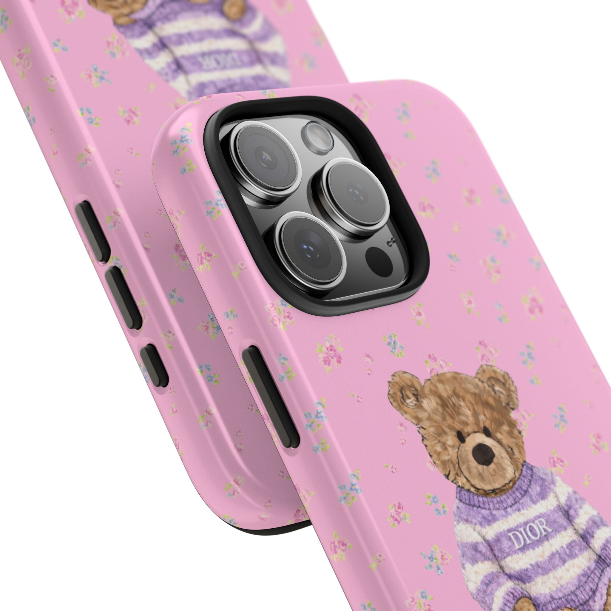 Pink floral phone case side view with teddy print, camera cutout, and side buttons