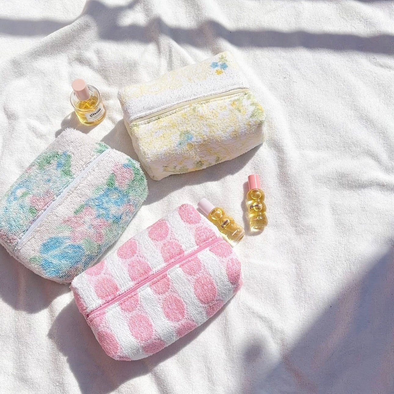 Pink teddy dot zip pouch, size S, white base with pink dotted pattern, closed