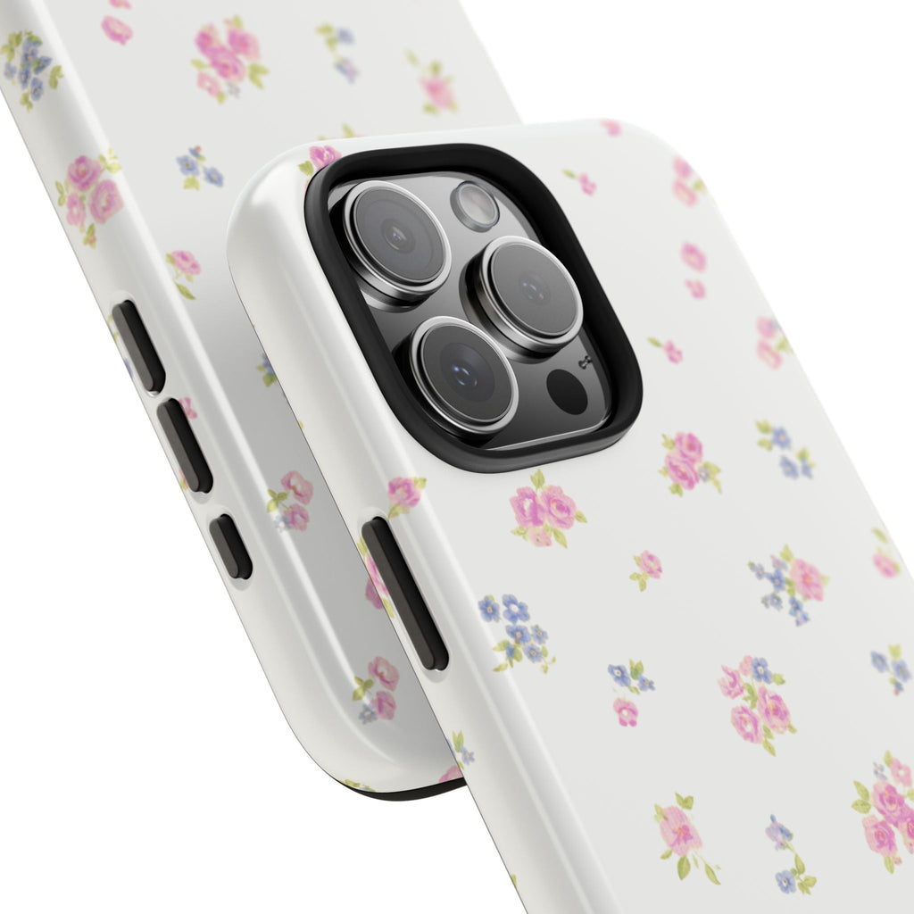 Angled white vintage floral phone case with pink roses and blue flowers print