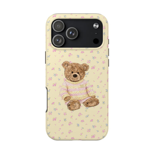 Cream teddy bear phone case with all-over small purple and blue floral pattern