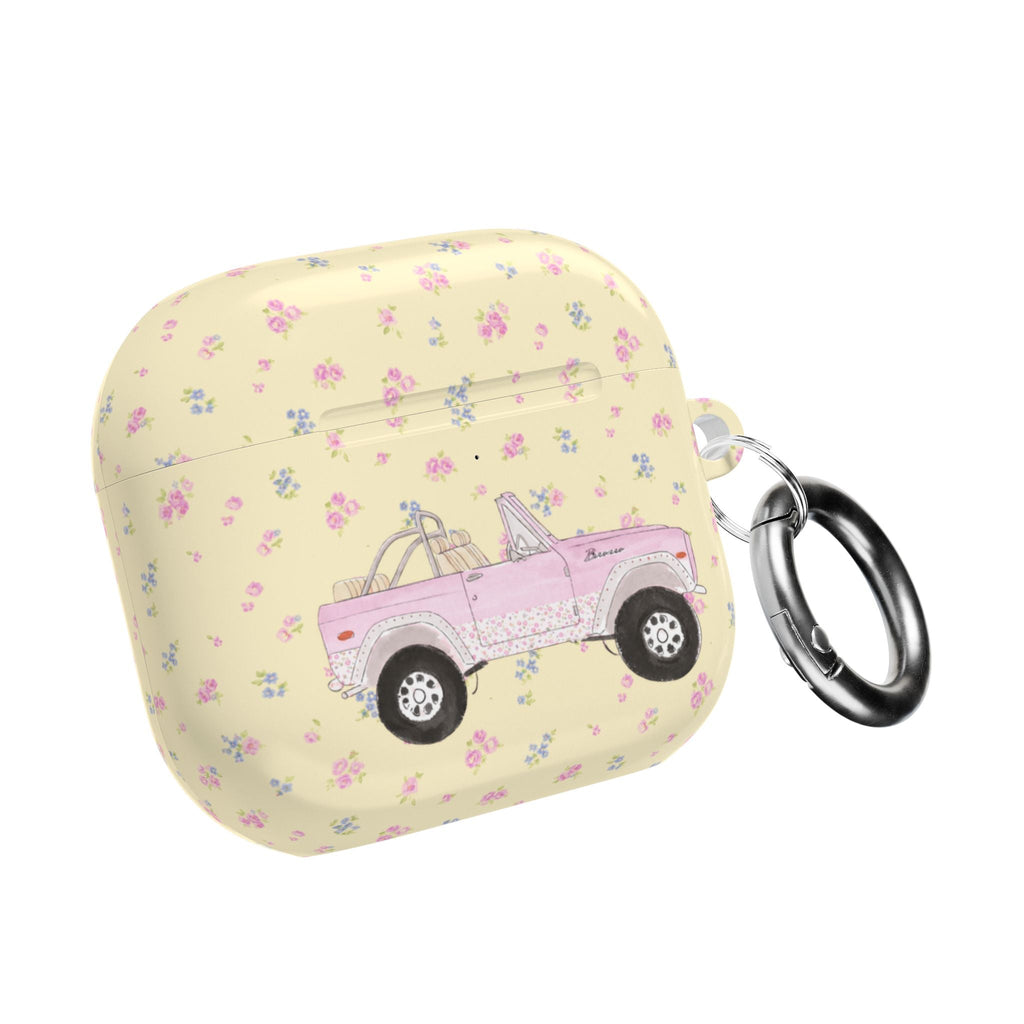Yellow floral AirPod case with pink pickup truck, side view with metal keyring