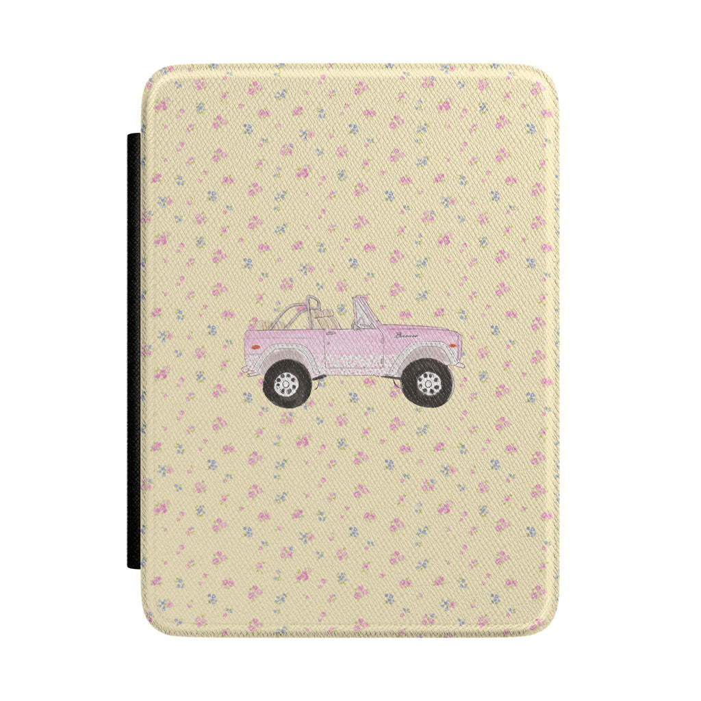 Hardcover e-reader case with beige floral pattern and pink vintage truck graphic