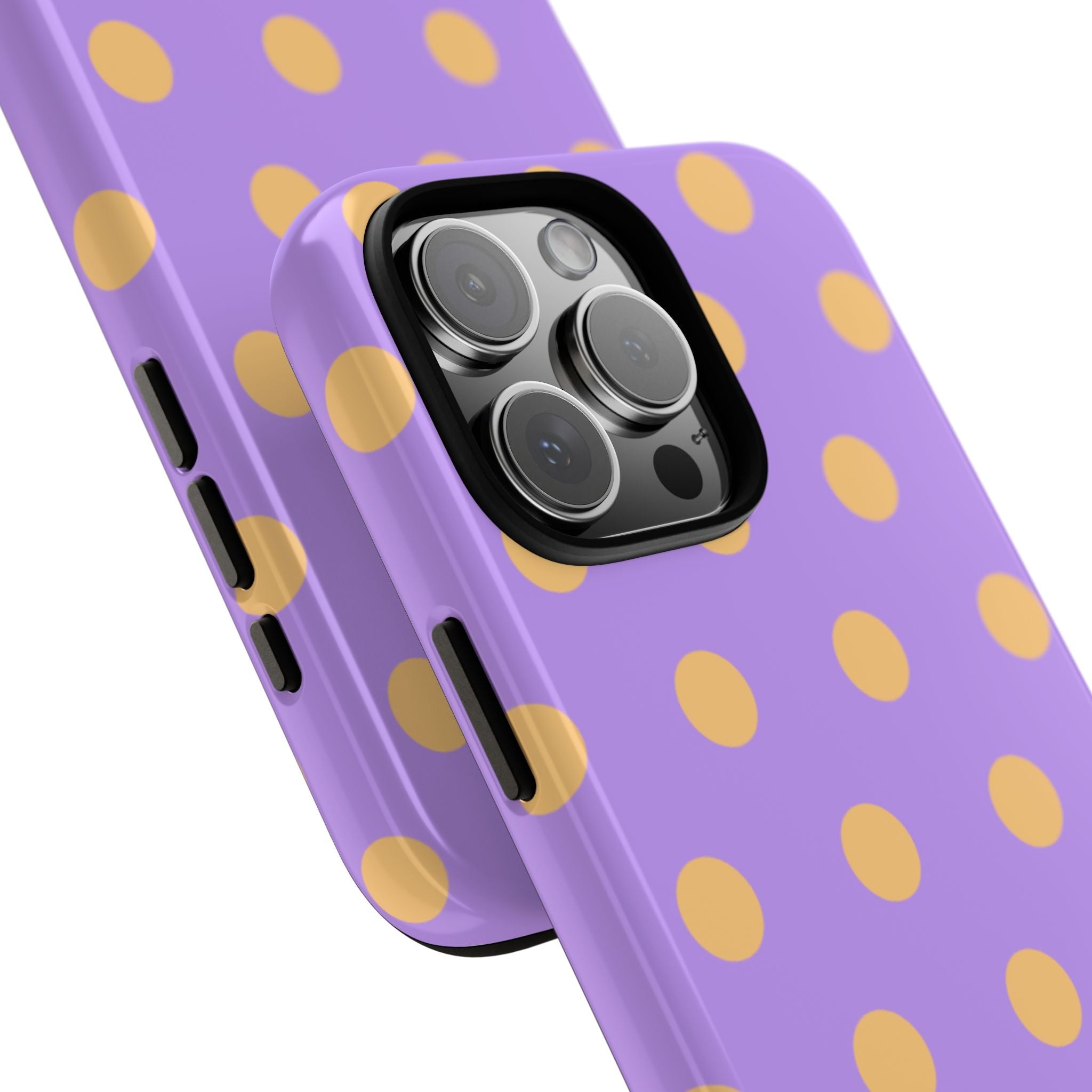 Close-up of purple polka-dot phone case showing camera module cutout and side edges