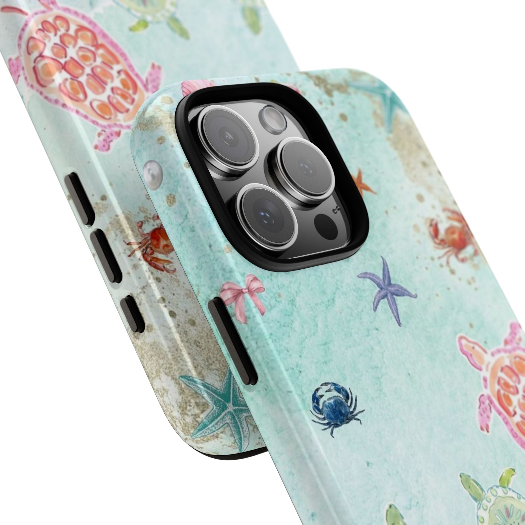 Close view of ocean phone case design with starfish, coral and crabs; camera lenses