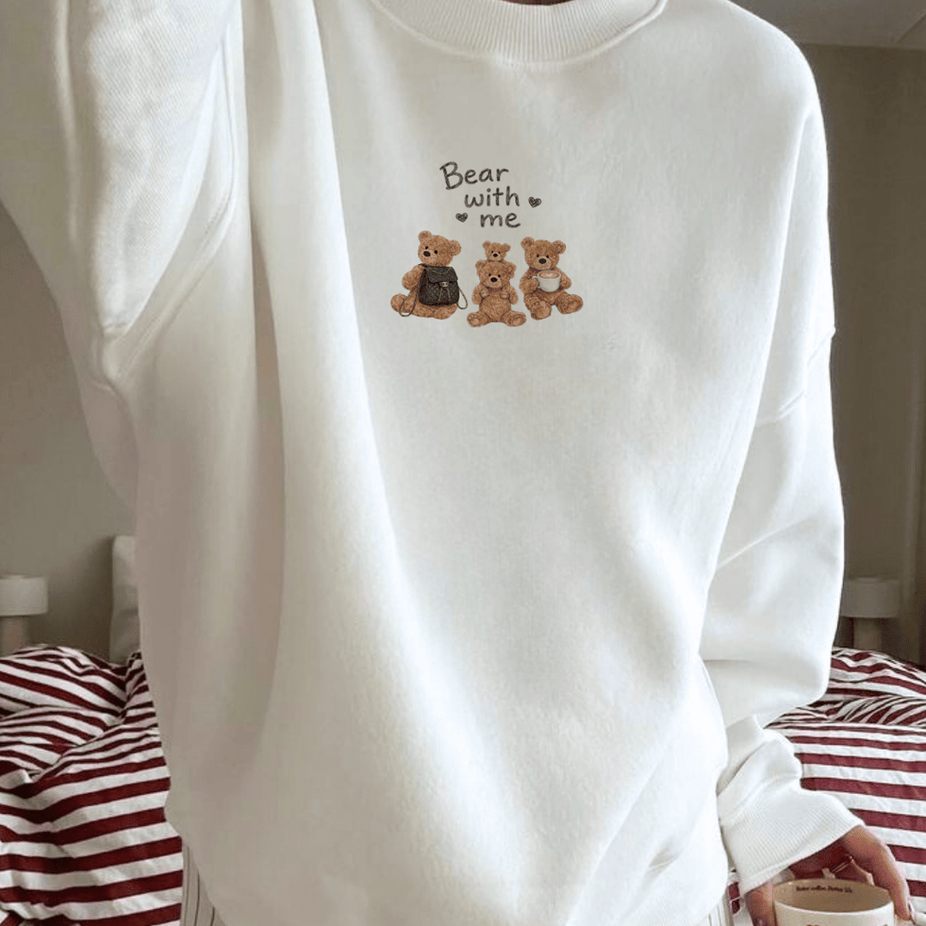 White crewneck sweatshirt, bear with me graphic