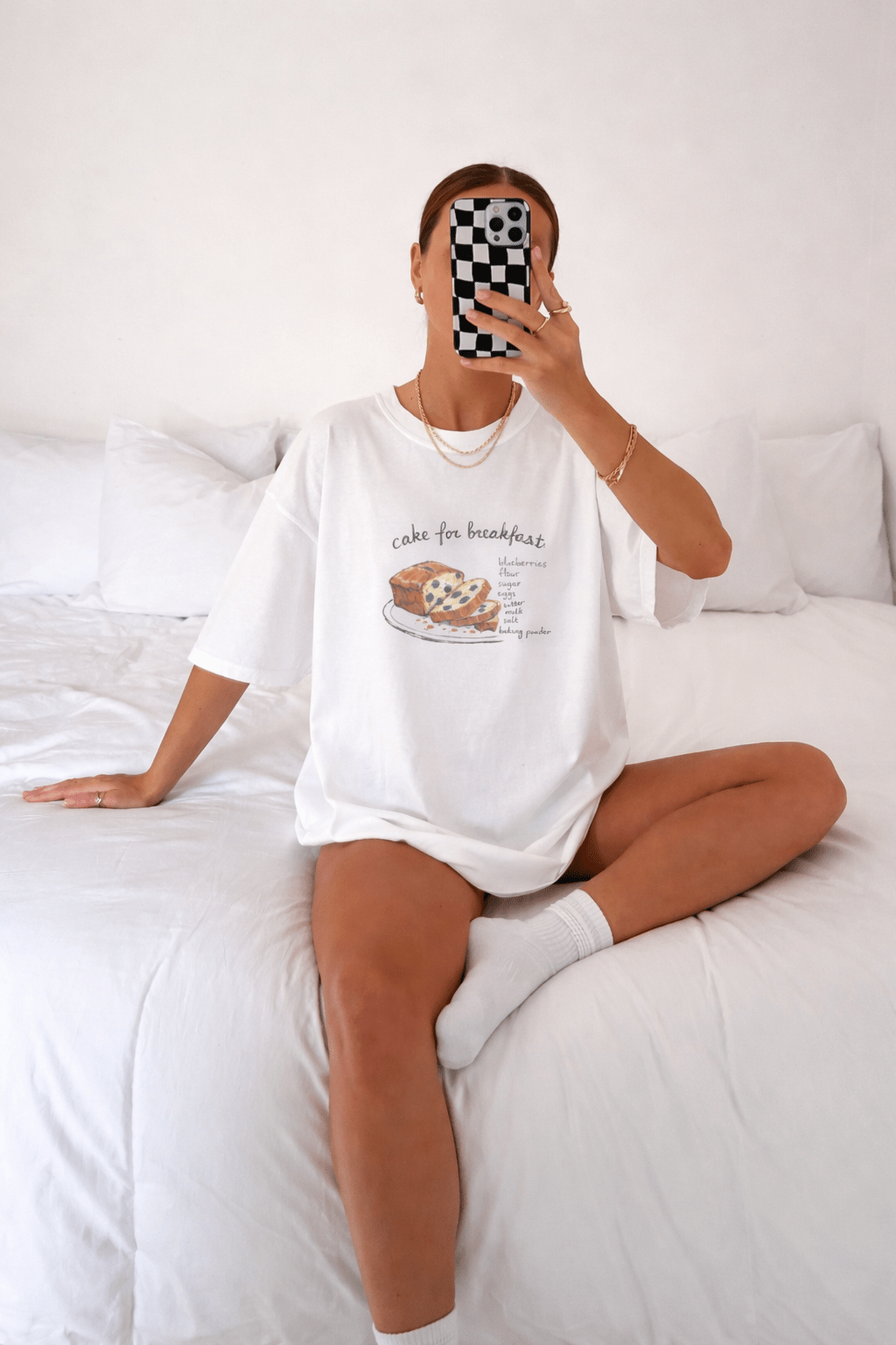 White T-shirt with cake for breakfast text and blueberry cake graphic, front view