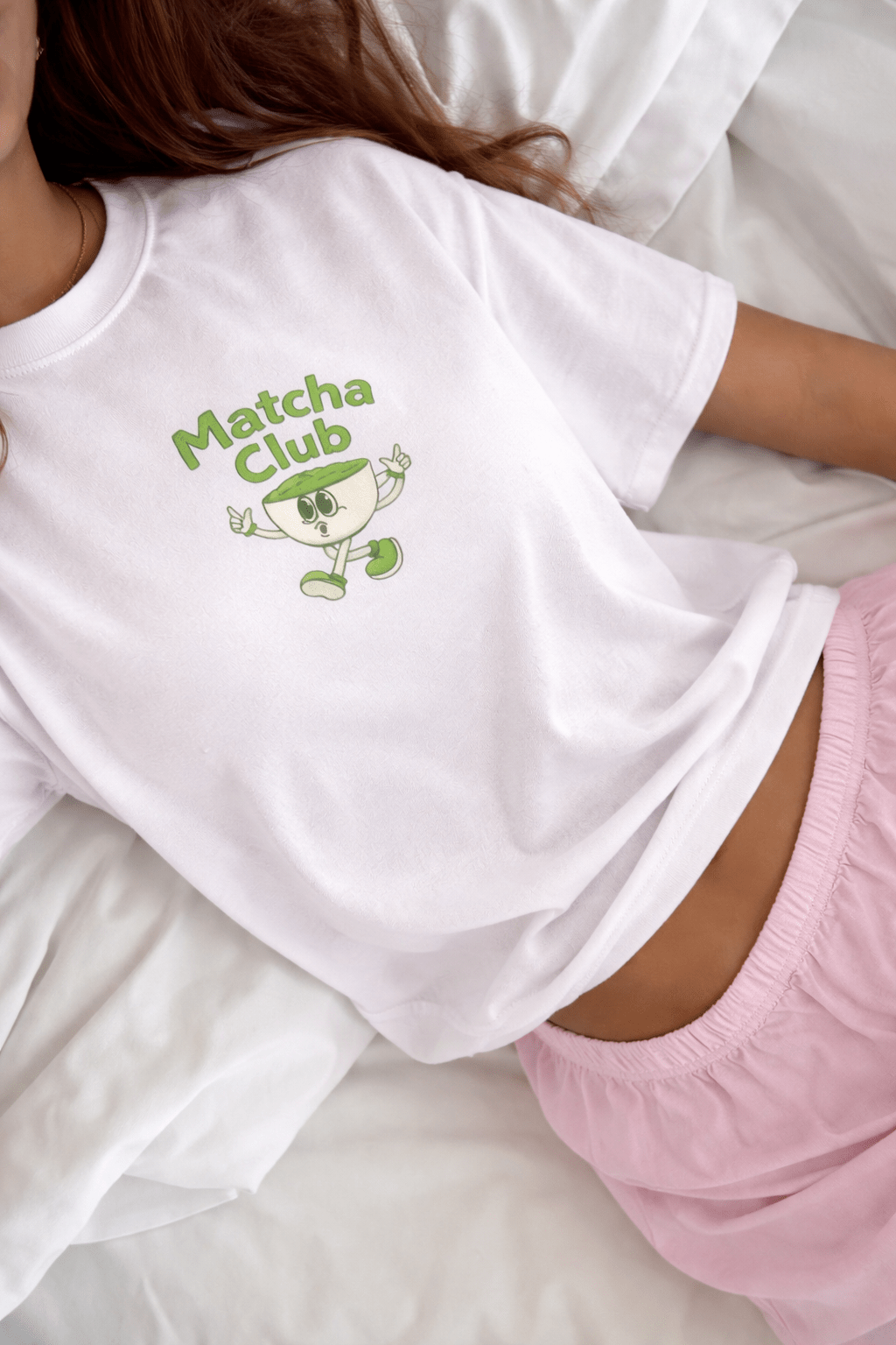White Matcha Club T-shirt back print with green cartoon character