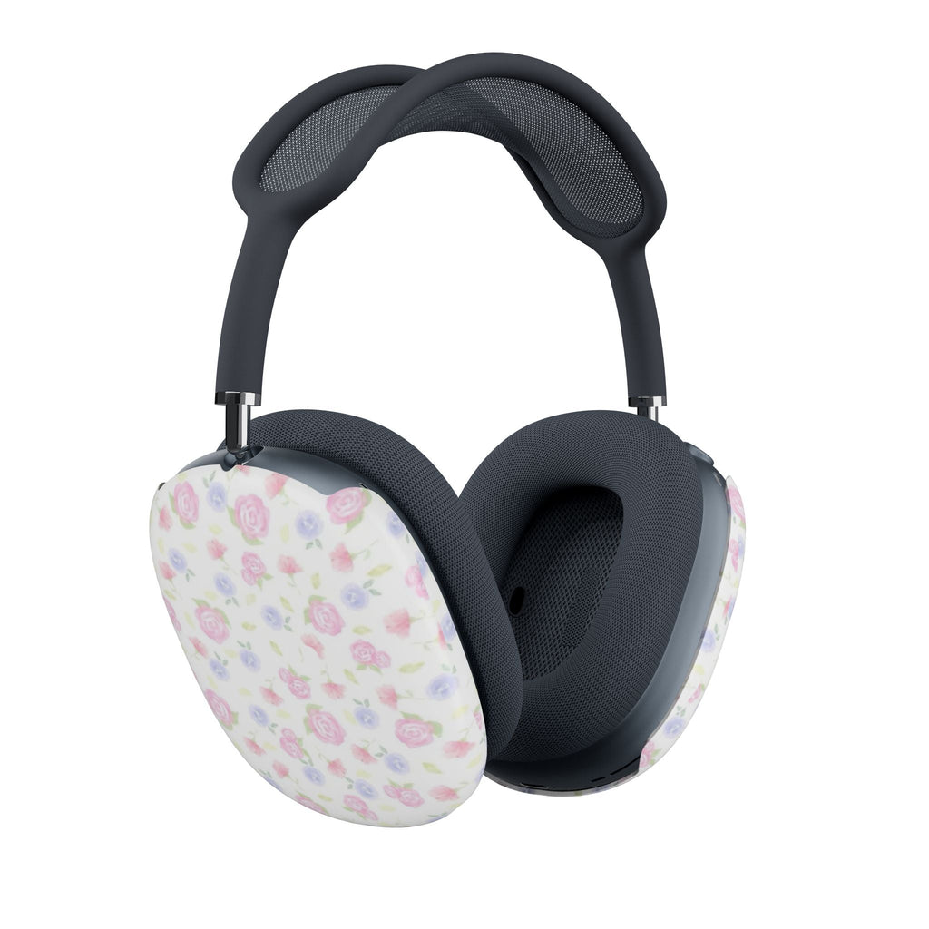 AirPods Max ear-cushion covers in white with pink and blue floral pattern, on headphones