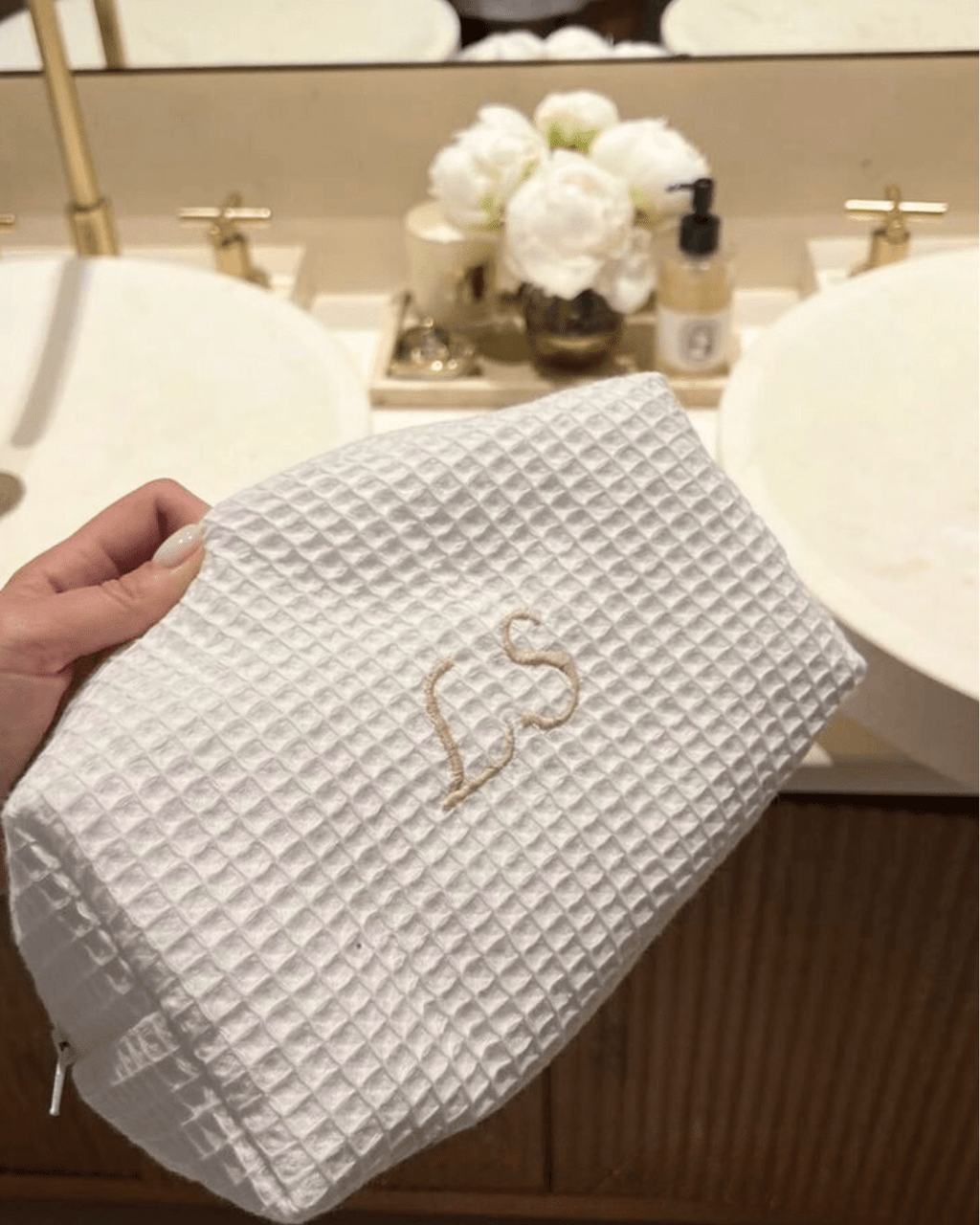 White waffle knit custom embroidery bag with gold script name on front