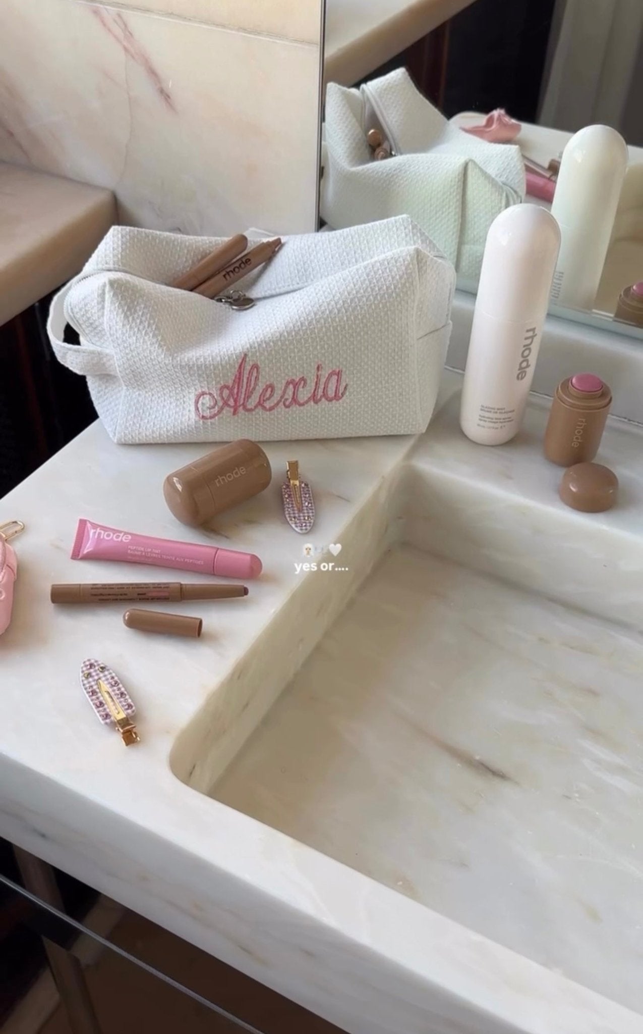 White waffle-knit custom embroidery bag with pink name text, rectangular pouch shape