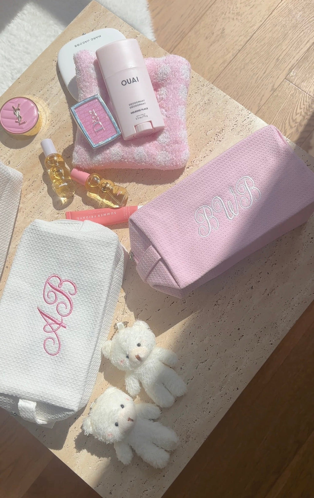 Pink waffle-knit custom embroidery bag with script monogram on textured fabric