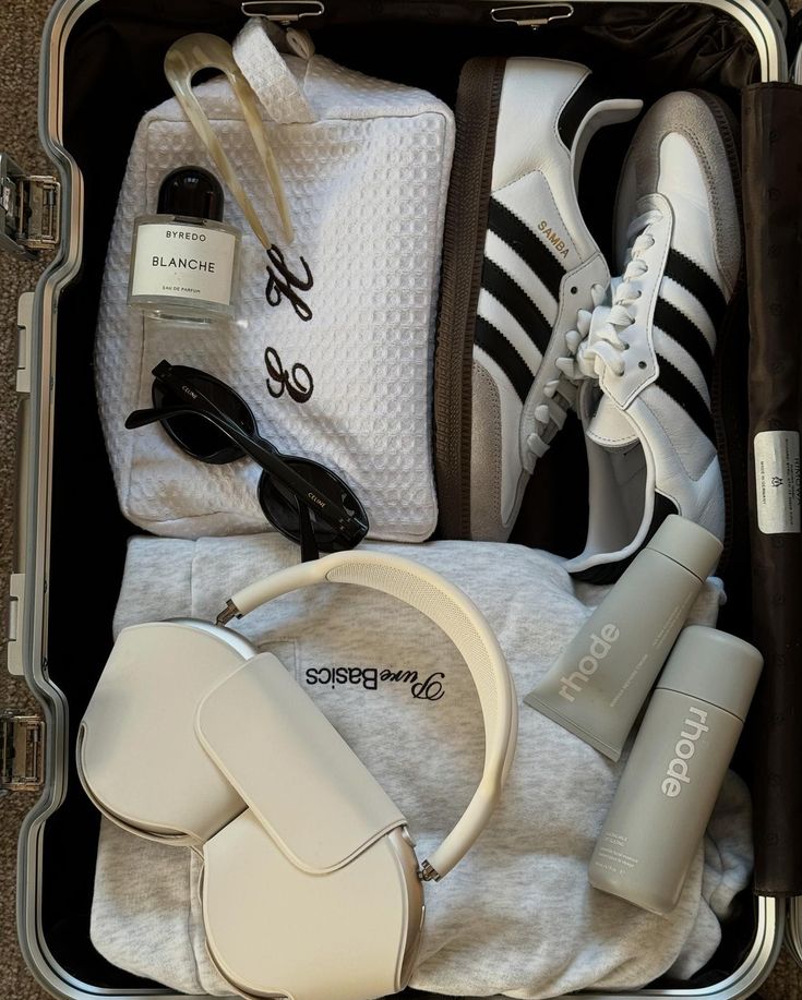 White waffle knit custom zip bag with black cursive monogram.