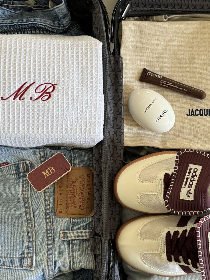 White waffle-knit custom embroidery pouch with monogram embroidery on textured fabric