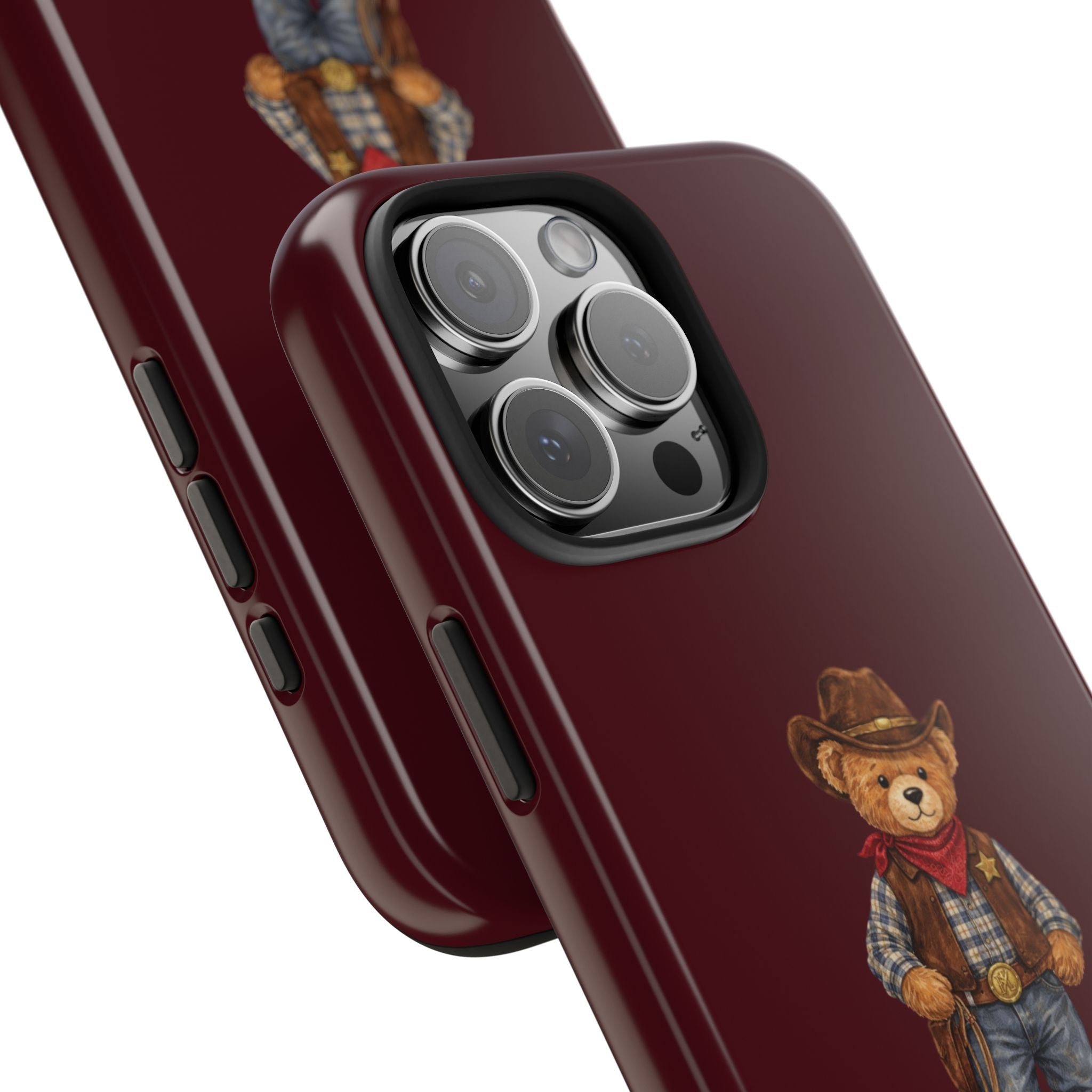 Wine red cowboy teddy phone case side view with button cutouts and partial bear graphic