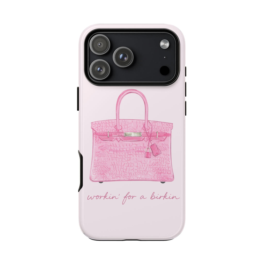 Pink phone case back with black camera panel, pink handbag graphic, and script