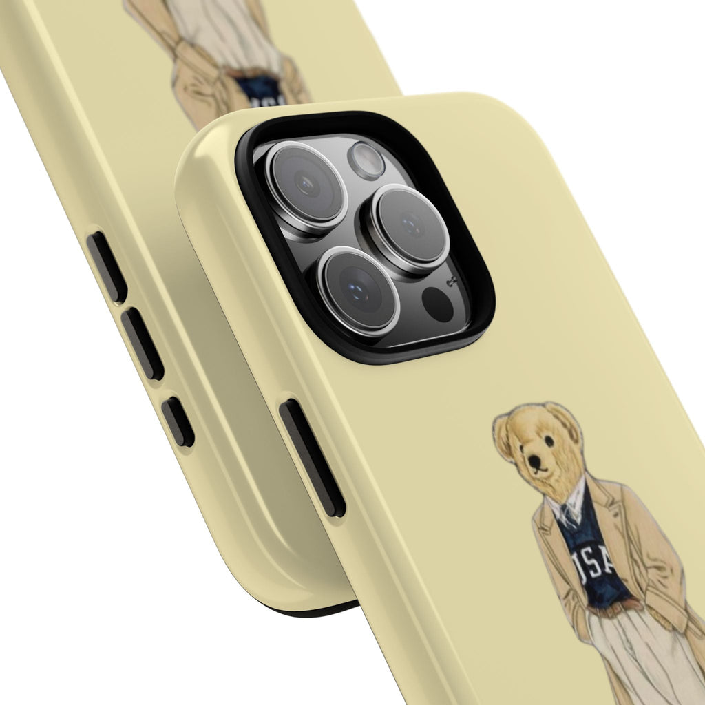 Yellow phone case with teddy bear graphic, side buttons cutouts, and camera lens openings