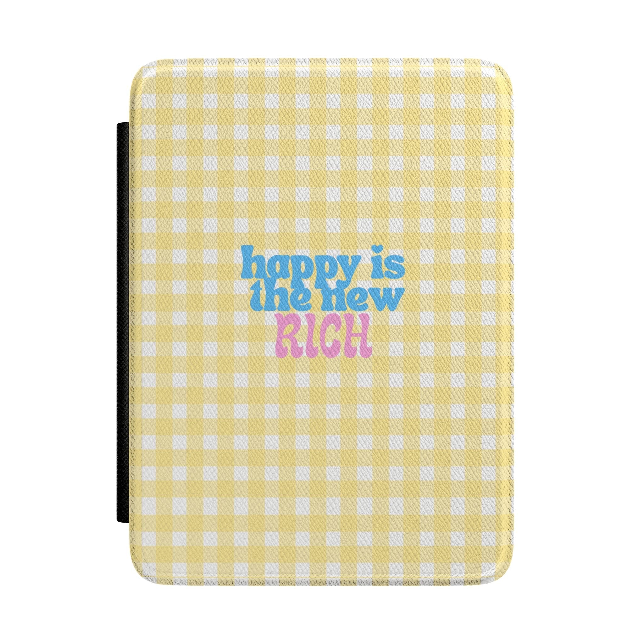 Yellow gingham hardcover Kindle case with “happy is the new RICH” text